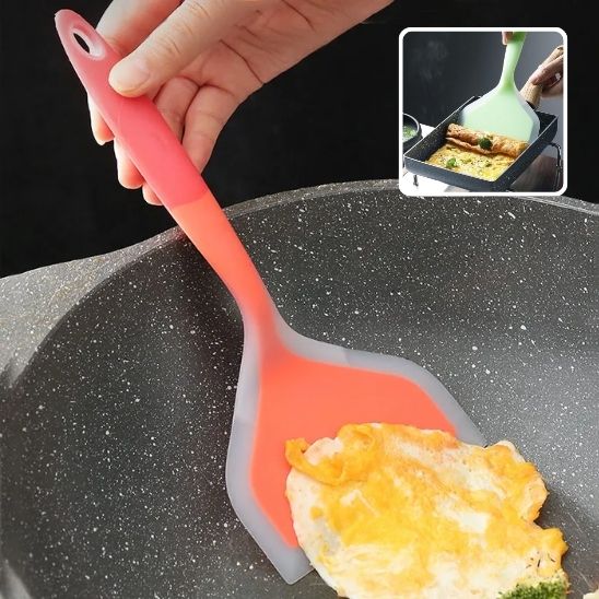 Spatule rouge tournant un Ćuf.