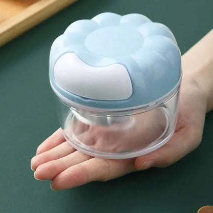 Hachoir manuel compact et portable pour petites préparations
